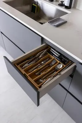 a drawer in a kitchen with some utensils at Luxury Downtown King Bed, Rooftop Pool in Cleveland