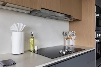 a kitchen with a counter with a bottle of wine at Luxury Downtown King Bed, Rooftop Pool in Cleveland