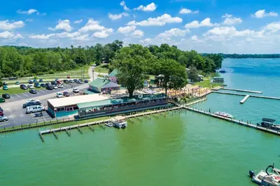 an aerial view of a marina next to a parking lot at The Heron House