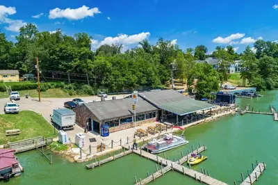 an aerial view of a marina with boats in the water at The Heron House