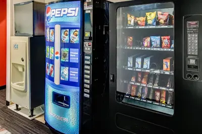 a pepsi vending machine with food and drinks at Red Roof Inn Springfield, OH in Springfield