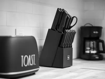a black knife block sitting on top of a counter at The Brick Treasury Loft in Cleveland
