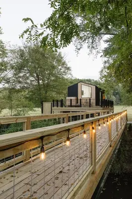 a bridge with lights and a truck on it at The Alto in Logan