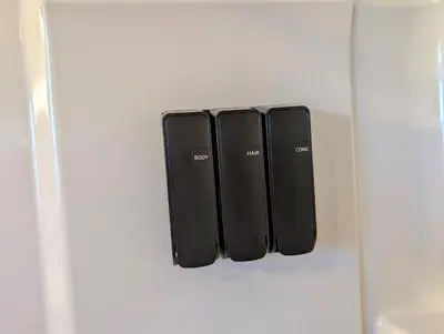 a white refrigerator with two blackddsomaly at Modern Norwalk Retreat 2 King Suites Sunroom in Norwalk