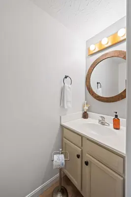 a bathroom with a sink and a mirror at Fire Ring Private Parking King Beds - Near Ark in Dry Ridge