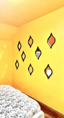 a yellow wall with a bunch of glasses on it at 3 Bedroom Home, near downtown, Tremont, Ohio City! in Cleveland