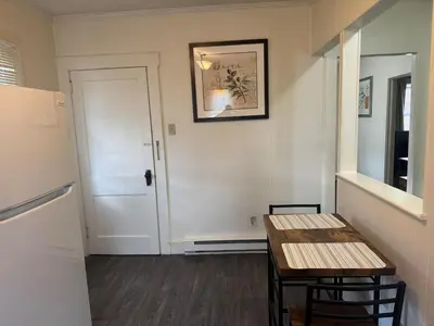 a small room with a table and a door at Perfect for Travel Nurses Quiet in Clarksburg