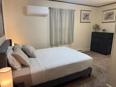 a bedroom with a white bed and a window at Perfect for Travel Nurses Quiet in Clarksburg