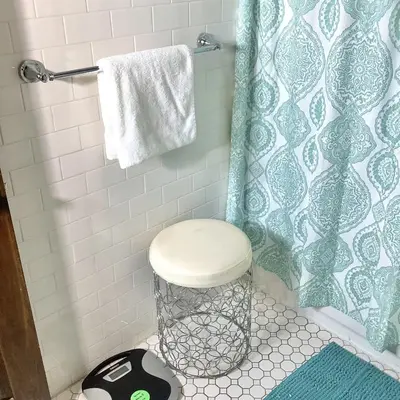 a bathroom with a toilet and a shower at 2 bedroom Loft apartment near downtown, Ohio city, Tremont! in Cleveland