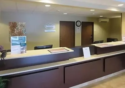 a waiting area in a hospital with a waiting room at Suburban Studios Washington, PA in Washington