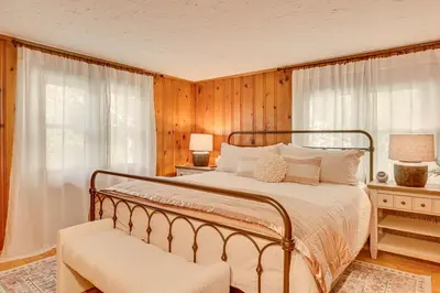 a bedroom with a large bed and a window at Trails, Wine and Events! Cuyahoga Falls Retreat in Cuyahoga Falls