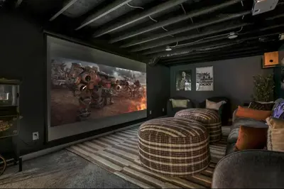 a living room with two couches and a painting on the wall at Edens Hillside Haven in Laurelville