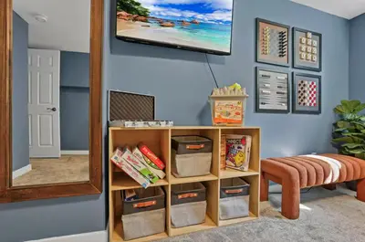 a room with a mirror and a shelf with bins at Edens Hillside Haven in Laurelville