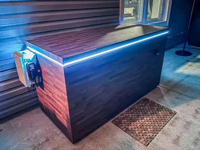 a wooden box with a pay phone on it at Edens Hillside Haven in Laurelville