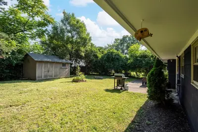a yard with a shed and a house at Home to Unwind in Columbus
