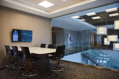 a conference room with a table and chairs at AC Hotel Cincinnati at Liberty Center in West Chester
