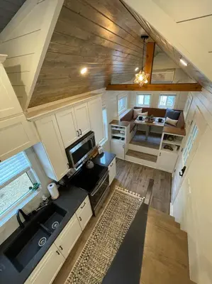an overhead view of a kitchen in a tiny house at Stargazers' Retreat A Tiny Home on the Riverside in New Richmond