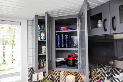 an open refrigerator filled with food and drinks at Hagrid's Hut - Harry Potter Riverfront Experience in New Richmond