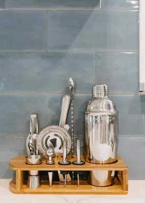 a shelf with various kitchen utensils on it at “Ivory Inn” - Cozy Modern Stay w/ Hot Tub - LEX in Lexington