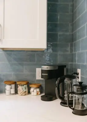 a coffee maker on a counter in a kitchen at “Ivory Inn” - Cozy Modern Stay w/ Hot Tub - LEX in Lexington