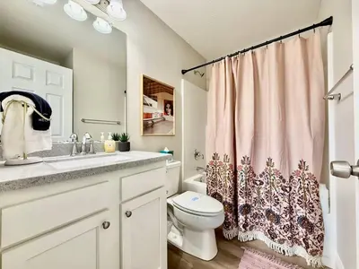 a bathroom with a sink and a toilet and a shower at Cozy Equestrian Themed Getaway in Wilmington in Wilmington