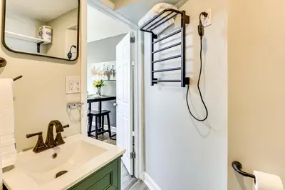 a bathroom with a shower and a sink at Close to Camden Clark Central Parkersburg Condo in Parkersburg