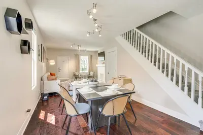 a kitchen and dining room with a table and chairs at Quiet & Spacious Home Near Downtown in Columbus