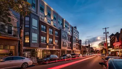 a city street with cars parked on the street at Landing Spectacular 2BD Gym in Cleveland
