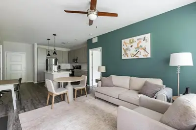 a living room with a couch and a table at Landing Apartment - Tapestry Ridge in Fort Wright
