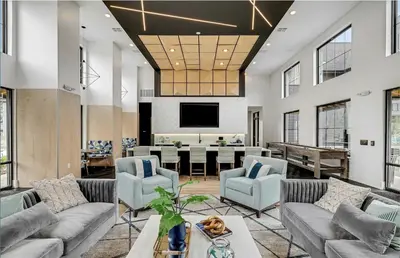 a living room with couches and a dining room at Landing Incredible 1BD Courtyard Gym