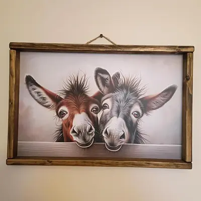 a picture of three goats in a picture frame at Cliffside Cottage in Mansfield