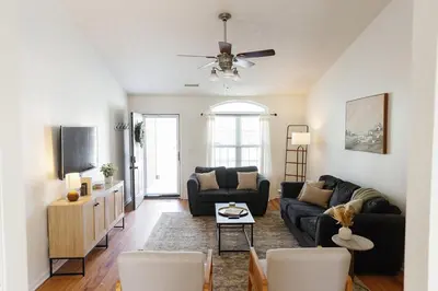 a living room with a couch and a tv at 