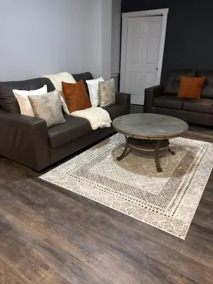 a living room with a couch and a coffee table at Brand new listing Aimi Luxury Retreat in Dayton