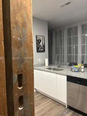 a kitchen with a sink and a counter at Brand new listing Aimi Luxury Retreat in Dayton