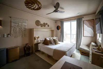 a bedroom with a bed and a ceiling fan at trekløveren in Covington