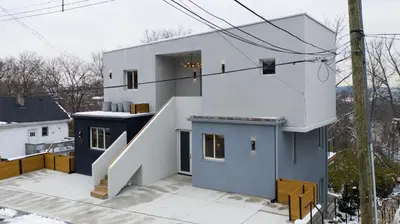 a house with a blue and white facade at trekløveren in Covington