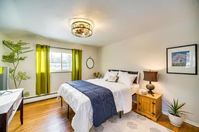 a bedroom with a bed and a window at Close to BW Campus and Univ Hospitals Berea Home in Berea