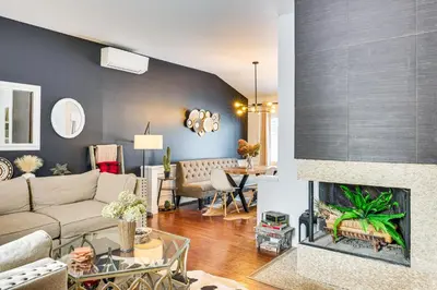 a living room with a couch and a fireplace at Close to BW Campus and Univ Hospitals Berea Home in Berea