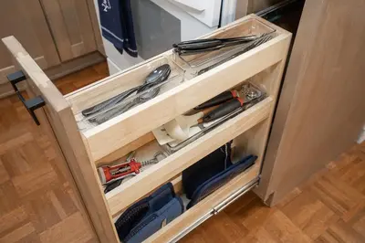 a drawer in a kitchen with some tools in it at Charming Renovated Home in Lakewood in Lakewood