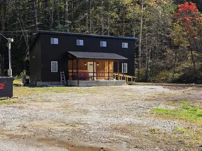 a large black building with a lot of windows at Our Place in Nelsonville