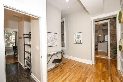 a home office with a desk and a chair at Gimme Shelter - OTR Cininnati in Cincinnati