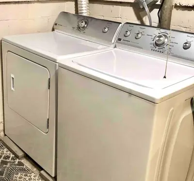 a white stove and a sink in a kitchen at Peaceful Cozy 2BR OASIS in Dayton