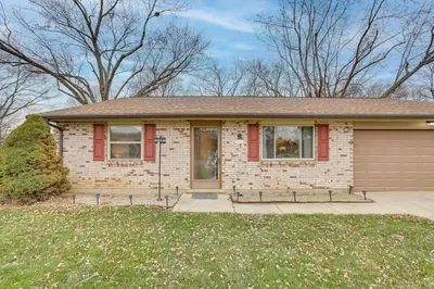 a small brick house with a garage at Great for Travel Nurses! Home 4 Mi to Dtwn Troy in Troy