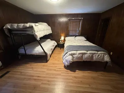 a bedroom with two bunk beds and a window at Prime 1BR- Minutes to Toledo, Sylvania and MI in Toledo