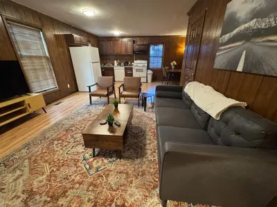 a living room with a couch and a table at Prime 1BR- Minutes to Toledo, Sylvania and MI in Toledo