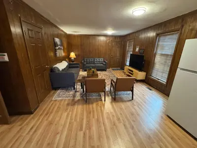 a living room with a couch and a table at Prime 1BR- Minutes to Toledo, Sylvania and MI in Toledo