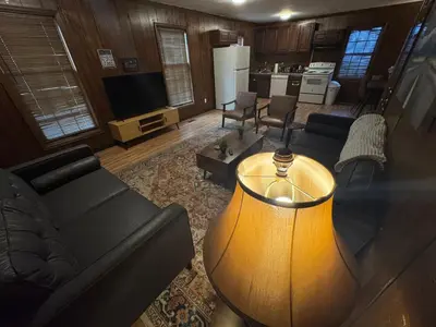 a living room with a couch and a table at Prime 1BR- Minutes to Toledo, Sylvania and MI in Toledo
