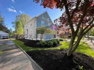 a house on a street with a tree at Cozy Berrodin Bed And Breakfast Whole House Booking In Highland Square Akron in Akron