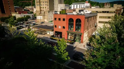 an aerial view of a building in a city at The Historic Berry Loft at Waterfront Hall in Wheeling