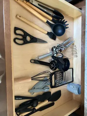 a drawer filled with lots of kitchen utensils at Charming House, just a short walk to downtown in Vermilion